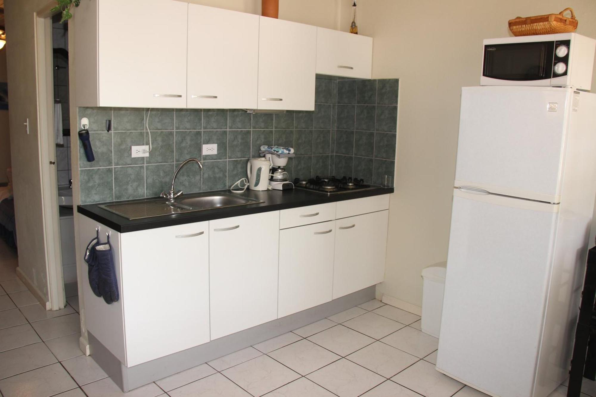 Camacuri Apartments Oranjestad Habitación foto