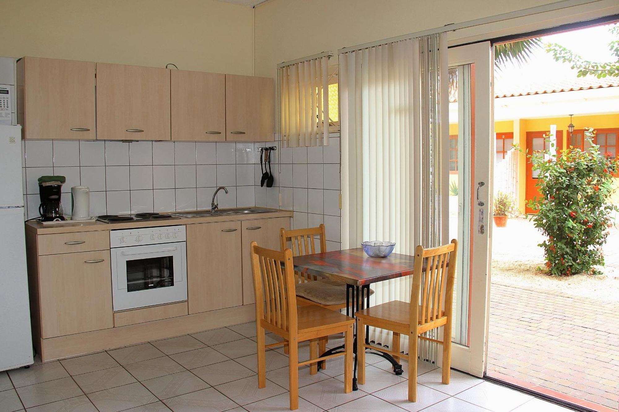 Camacuri Apartments Oranjestad Habitación foto